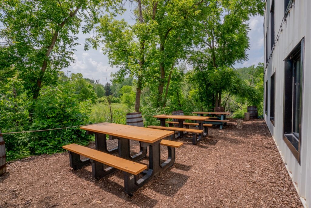 Outdoor seating overlooking a field